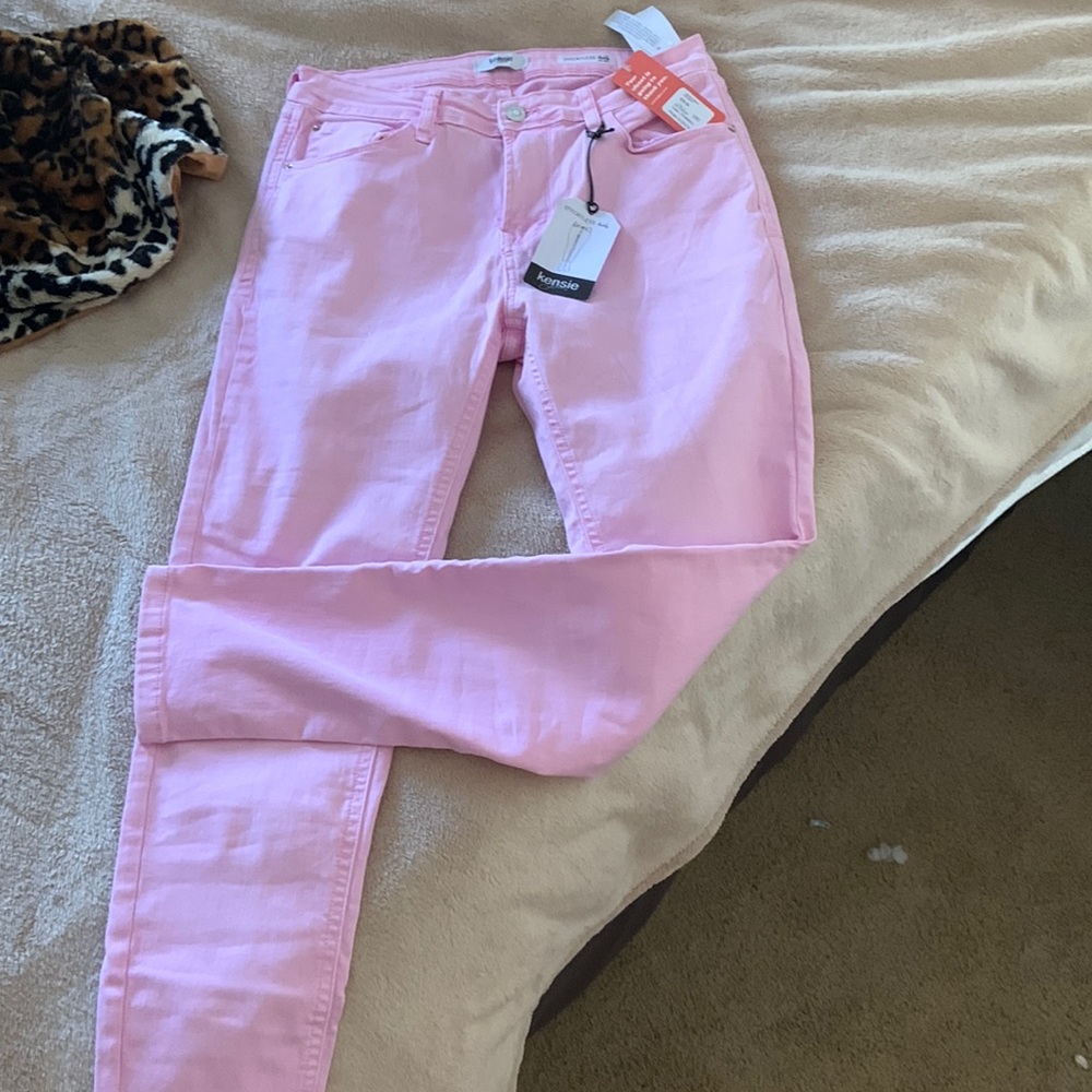 Pink ankle mid rise jeans.